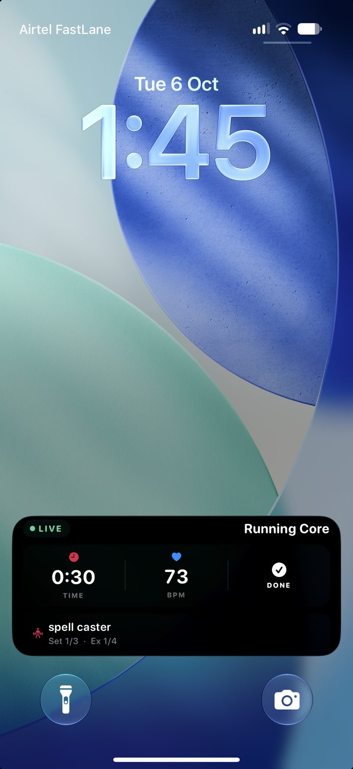 Lock Screen Live Activity during an exercise, with live heart rate and a Done button